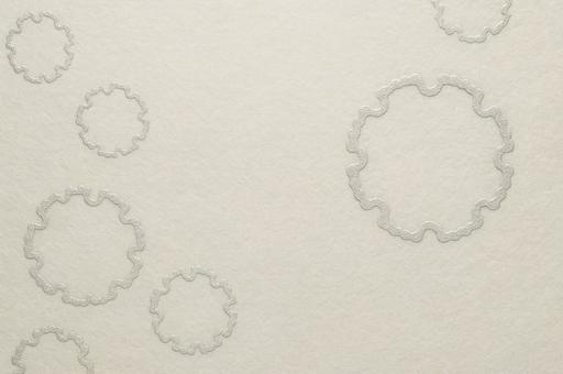白銀であしらった和紙雪輪文様を背景 白銀であしらった和紙雪輪文様を背景の写真