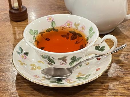 紅茶と砂時計とポット 木目,砂時計,紅茶用の写真素材