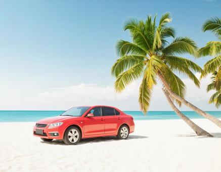 ビーチの赤い車 ビーチの赤い車の写真