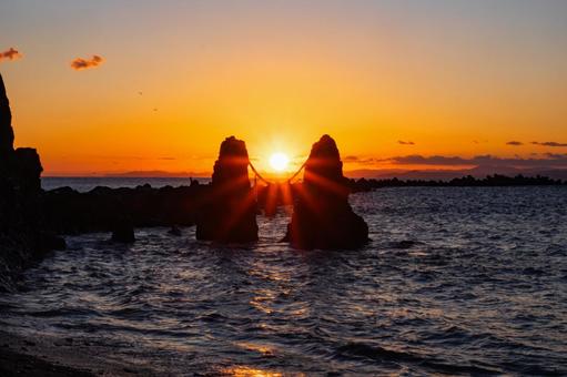 The Meoto Iwa rocks of Cape Teyui illuminated by the setting sun, couple rock, cape tei, married couple, JPG