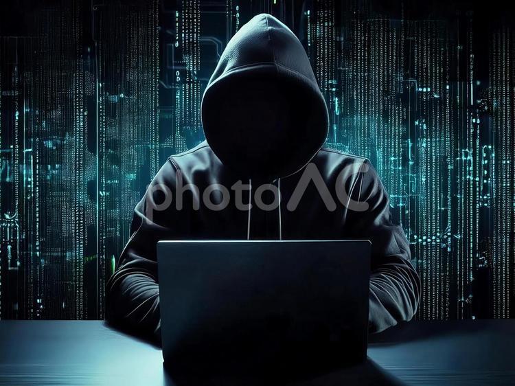 ハッキングを行うハッカー ハッキング,ハッカー,サイバー攻撃の写真素材
