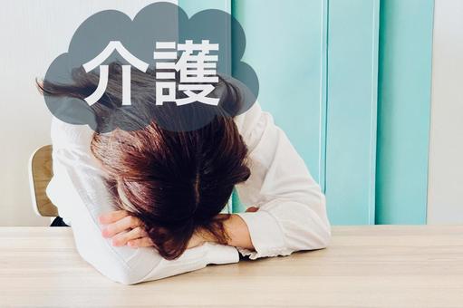 介護に疲れている女性 介護に疲れている女性 介護,女性,育児の写真素材