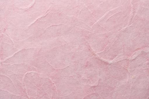淡いピンク色の和紙テクスチャ 和紙,紙,ピンクの写真素材