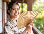 扇子で涼む、浴衣の彼女 女性,扇子,浴衣の写真素材