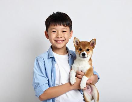 犬と子供の写真