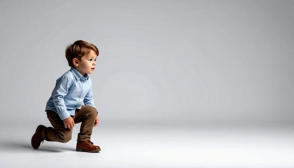 Boy trying to stand up Gray background, boy, gray background, stand up, JPG