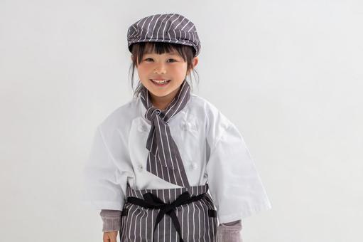 シェフの格好をした女の子 シェフの格好をした女の子 シェフ,子ども,職業体験の写真素材