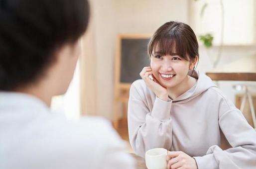 Asian men and women talking with a smile Asian men and women talking with a smile