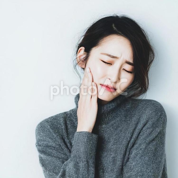 歯痛を訴える女性 女性,虫歯,歯の写真素材