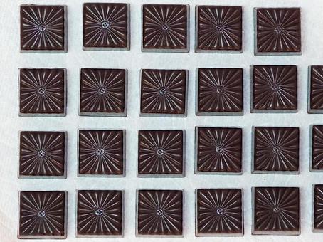 模様入りチョコレートの整列 チョコレート,模様,四角の写真素材