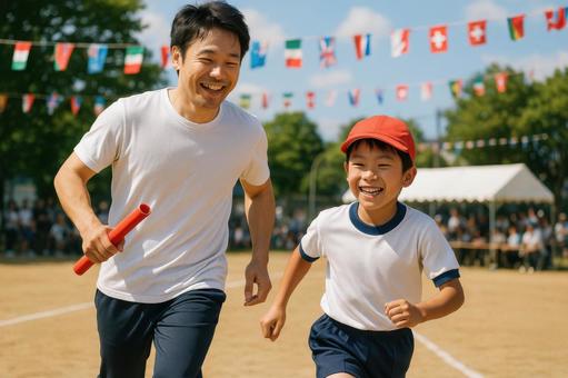 保護者と一緒に走る親子競技のシーン 保護者と一緒に走る親子競技のシーンの写真