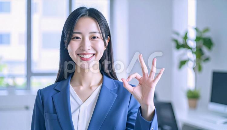 OKサインをする女性 サイン,マル,okの写真素材