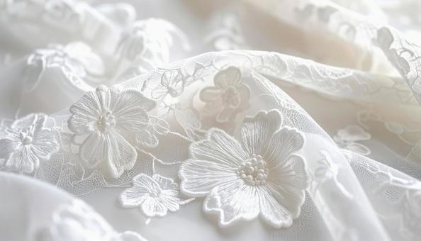 花柄刺繍の白いレース生地 花柄刺繍の白いレース生地の写真