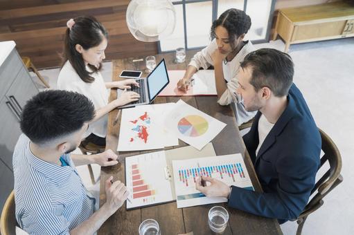 Businessmen meeting in a casual office space, business, meeting, conference, JPG