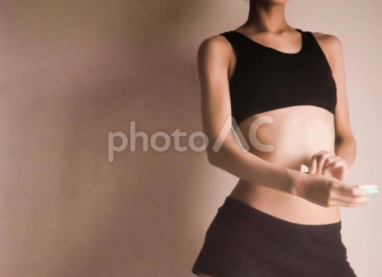 女性のウエストとメジャー 女性,ウエスト,腰の写真素材