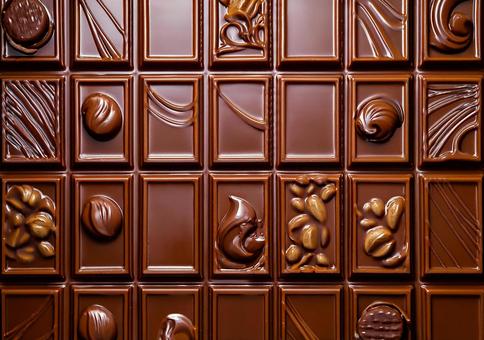 装飾チョコが並ぶ高級テクスチャの写真