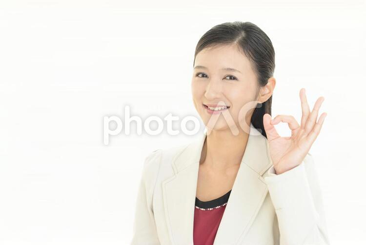 OKサインを出す笑顔の女性 女性,ビジネスウーマン,女の写真素材