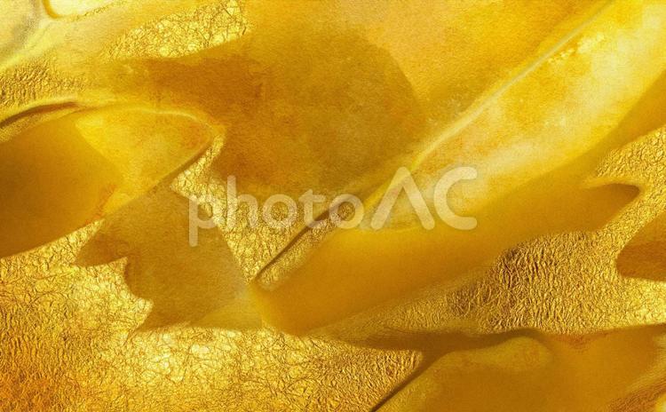 細かいでこぼこの質感のある金色の背景素材 テクスチャ,背景,金色の写真素材