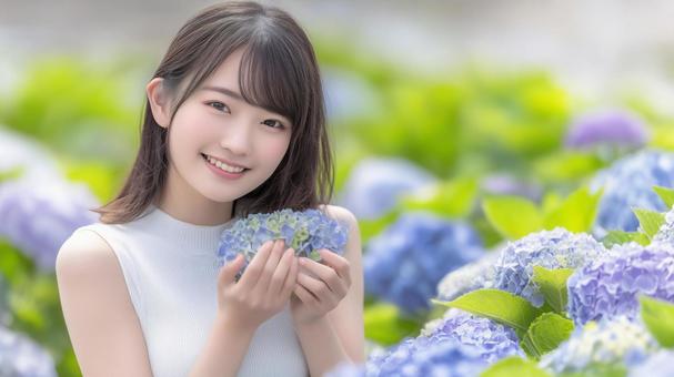 アジサイと白いワンピースの女性 アジサイと白いワンピースの女性の写真