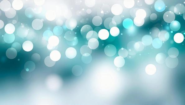 蒼緑とシルバーのボケ効果の背景の写真