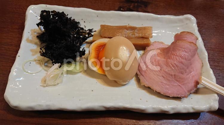 ラーメンのトッピング ゆで卵,煮卵,チャーシューの写真素材