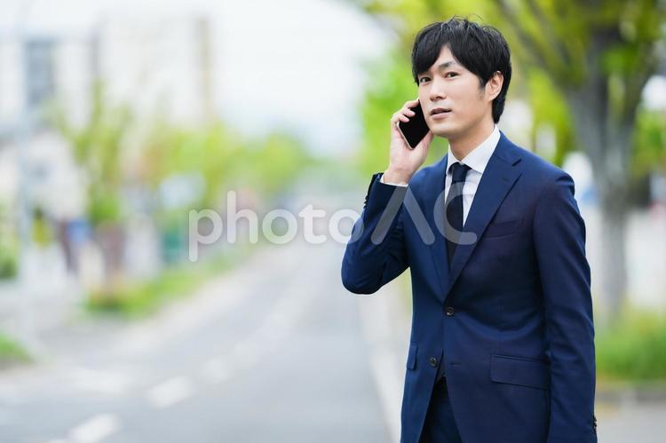 奥行きのある道路とビジネスマン 人物,ビジネス,リクルートの写真素材