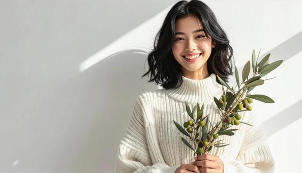 オリーブの枝と女性 オリーブの枝と女性の写真