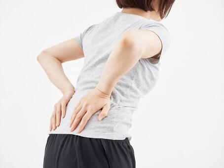 A woman holding her aching waist on a white background, آلام أسفل الظهر, وسط, اصابة في الظهر, JPG