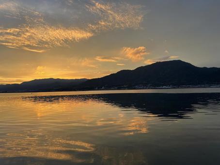 Sunrise and calm sea, JPG
