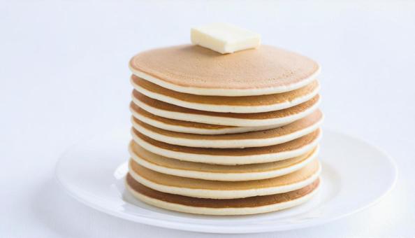 シンプルなパンケーキとバター シンプルなパンケーキとバターの写真