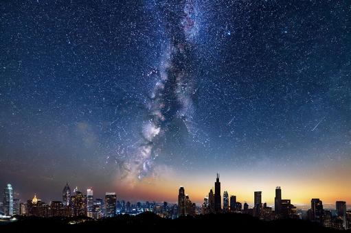 夜景の街並みと星空 夜景の街並みと星空の写真