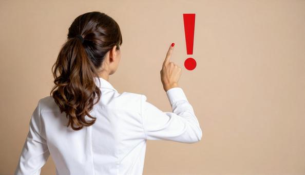 注意! 赤い「!」と人差し指 注意! 赤い「!」と人差し指の写真