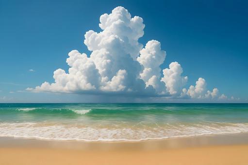夏の砂浜と入道雲の写真