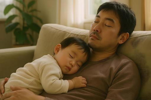 父と赤ちゃんの昼寝 父と赤ちゃんの昼寝の写真