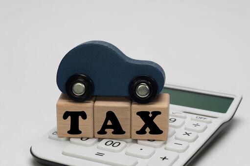 電卓と自動車税や車の維持費のイメージ 自動車税,tax,維持費の写真素材