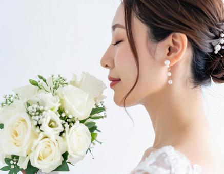ウエディングドレスを着た女性 白い花21 ウエディングドレスを着た女性 白い花21の写真