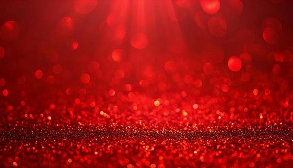 赤い輝きのキラキラ背景 の写真