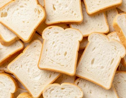 大量の食パンを敷き詰めた背景素材　1の写真