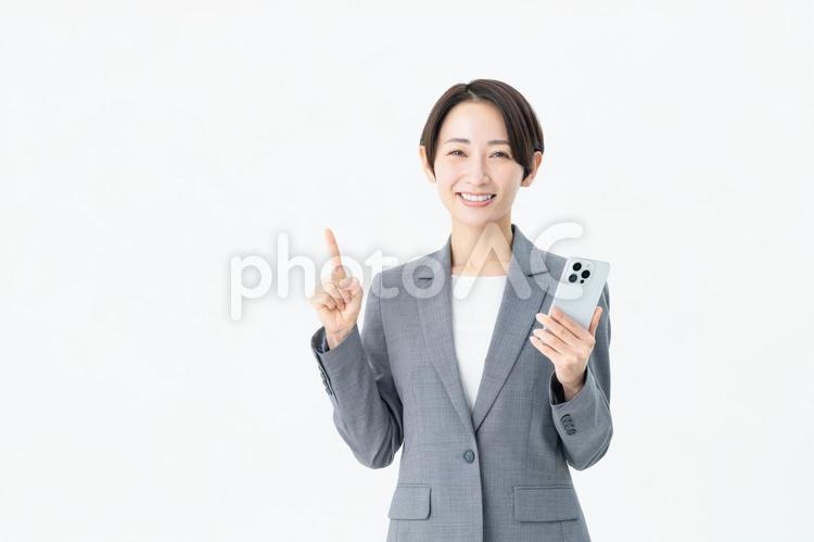 スマホでおすすめするビジネスウーマン おすすめ,スマホ,ビジネスウーマンの写真素材