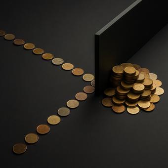 仕切りを越える硬貨（蓄積と障壁）の写真