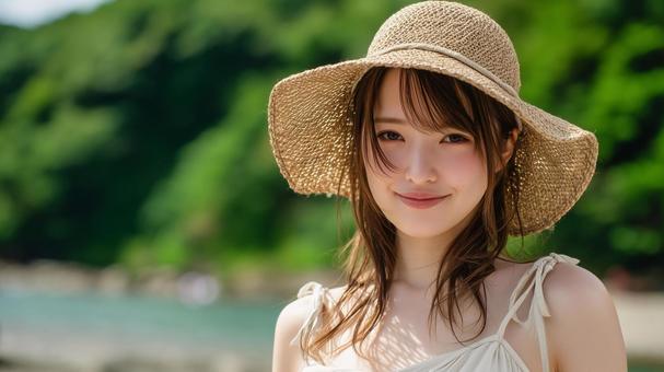 夏の深緑と渓流沿いの遊歩道と若い女性 夏の深緑と渓流沿いの遊歩道と若い女性の写真