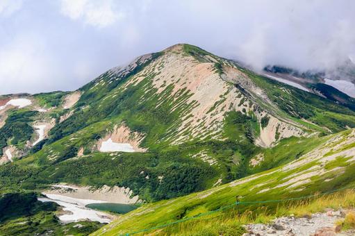 白馬から見る鉢ヶ岳 白馬から見る鉢ヶ岳 鉢ヶ岳,白馬岳,長野の写真素材