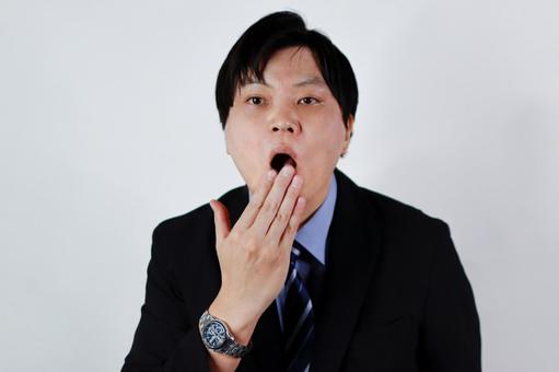 ビジネスマンの欠伸 ビジネスマンの欠伸 ビジネスマン,男性,欠伸の写真素材