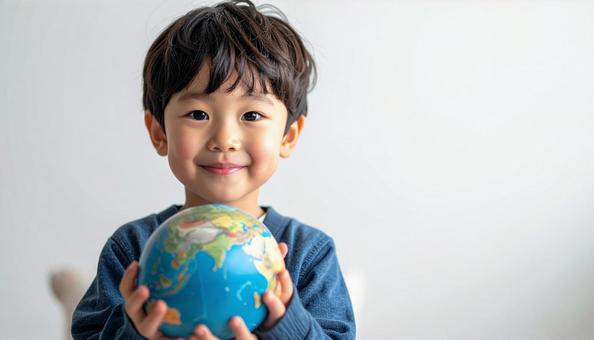 子供と地球儀、コピースペース 子供と地球儀、コピースペースの写真