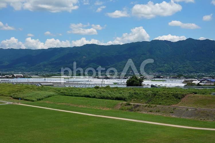 北野町の街並みと耳納連山（寄り） 筑後川,耳納連山,ビニールハウスの写真素材