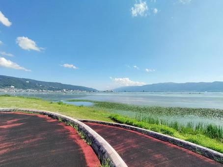 広がる湖 広がる湖 湖,諏訪湖,空の写真素材