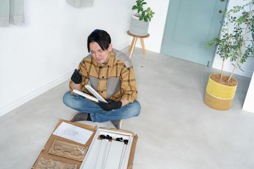 DIYを失敗して困る男性 職人,作業員,リフォームの写真素材