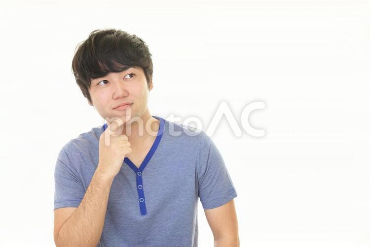 考え事をする男性 男性,男,ストレスの写真素材