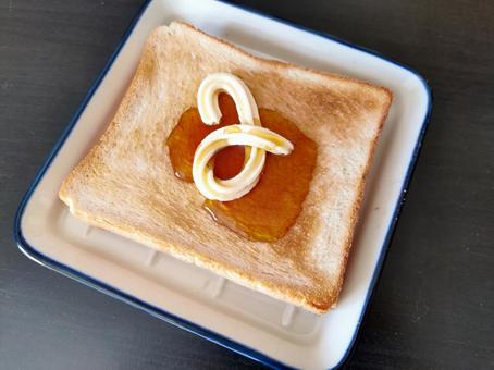 トーストに乗せられたマーマレード トースト,食パン,パンの写真素材