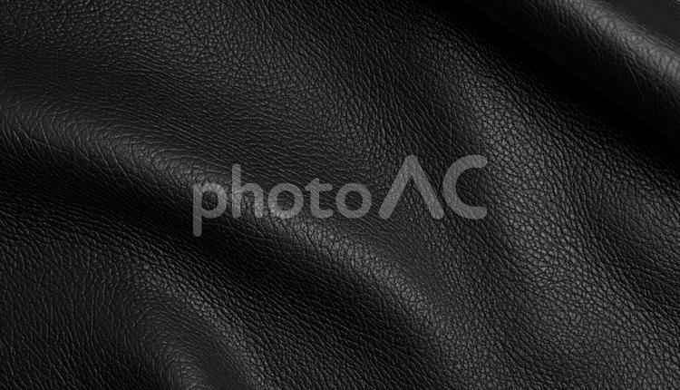 黒色のリアルな質感のレザーの背景 黒色,無地,べたの写真素材
